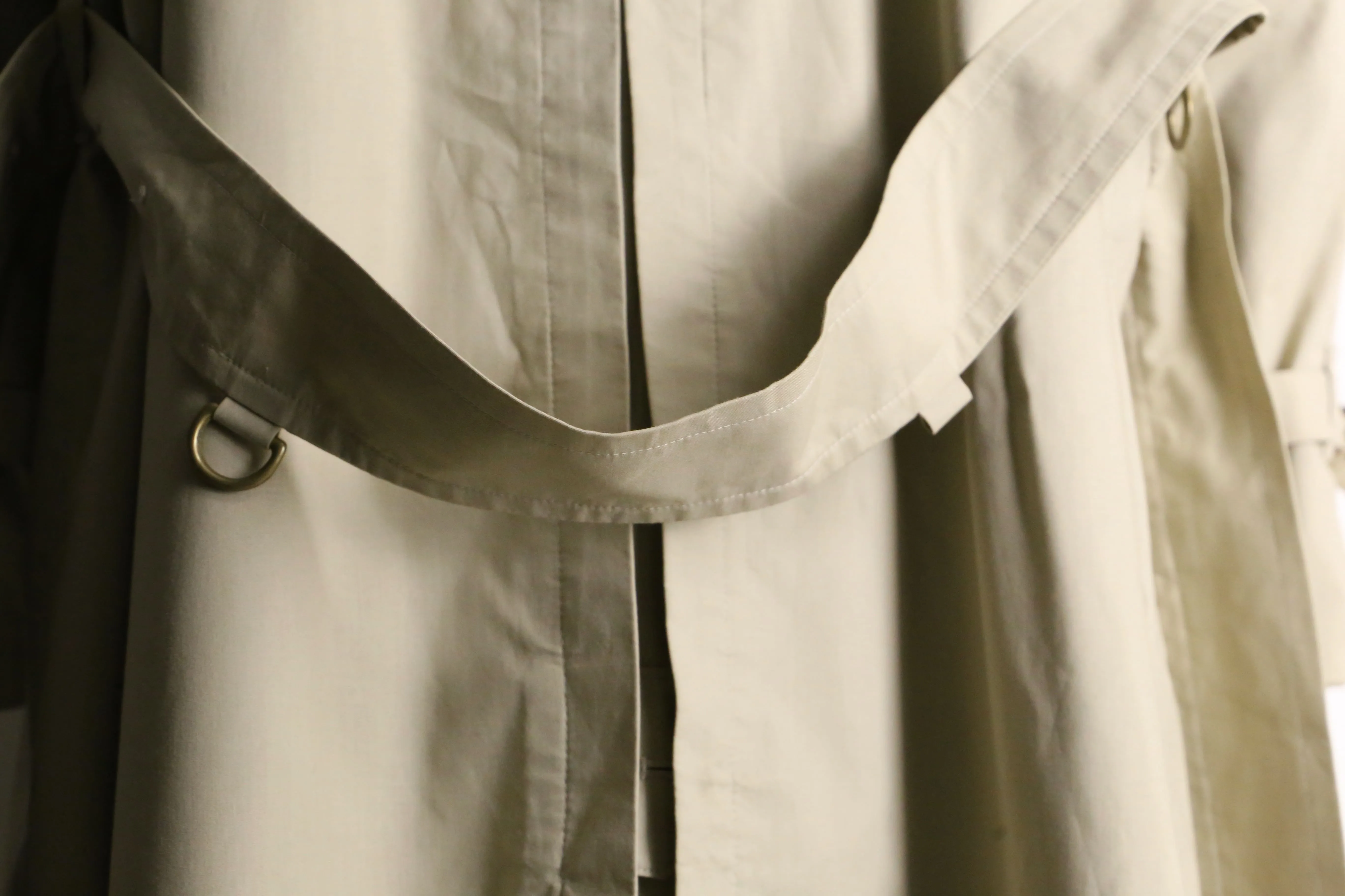 "Burberry's" natural beige long trench coat